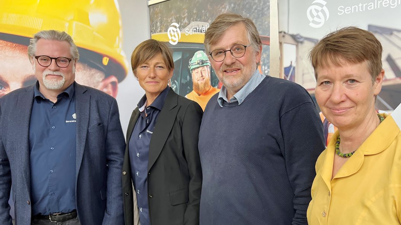 Gruppebilde av fire personer